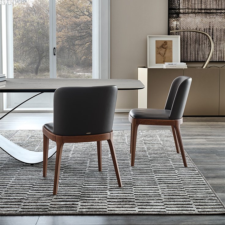 Magda Chaise design haut de gamme de Cattelan Italia avec structure en bois massif et dossier enveloppant, disponible chez D-Style Interior.