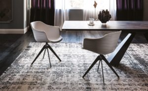 Indy Fauteuil design en polyuréthane souple, élégant et polyvalent, idéal pour les espaces de travail modernes, signé Cattelan Italia et disponible chez D-Style Interior.