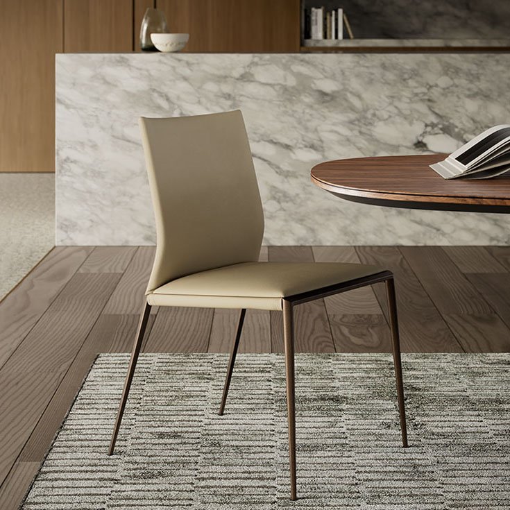 Eva Chaise design de Cattelan Italia, alliance de minimalisme, confort et lignes futuristes. Une assise ergonomique et élégante. Disponible chez D-Style Interior.