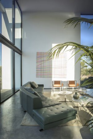 Canapé design haut de gamme Kennedee par Poltrona Frau, système modulable avec matelassage main motif X, disponible chez D-Style Interior