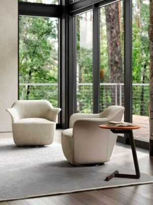 Fidelio | Table basse design haut de gamme Poltrona Frau elliptique, piètement en frêne massif moka ou wengé, plateau cuir Saddle Extra et Pelle Frau®, détails laiton, disponible chez D-Style Interior