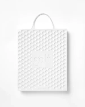 Livre design haut de gamme Golf: The Impossible Collection par Assouline, édition Ultimate sous écrin blanc brillant, disponible chez D-Style Interior.