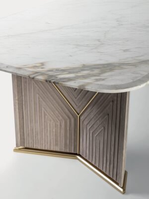 Pinto table de Vittoria Frigerio, avec plateau en marbre biseauté et base matelassée en cuir. Un design luxueux et personnalisable. Disponible chez D-Style Interior.
