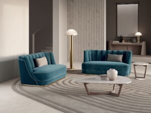 Bianca canapé design haut de gamme par Vittoria Frigerio, avec dossier capitonné, base en or ou bronze brillant et finitions raffinées. Une pièce compacte au confort luxueux. Disponible chez D-Style Interior.