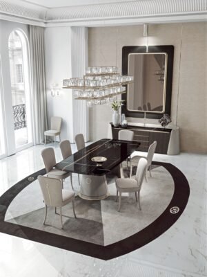Foscari table de Vittoria Frigerio, avec plateau en marbre et pieds habillés de cuir ou tissu. Une pièce luxueuse pour salle à manger. Disponible chez D-Style Interior.
