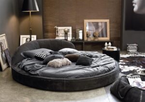 Drums table basse de Gamma Arredamenti, une création en cuir avec plateau en verre, céramique ou marbre. Élégance et design italien chez D-Style Interior.