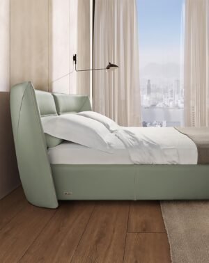 Tulip Night lit de Gamma Arredamenti, un modèle en cuir au design contemporain avec tête de lit incurvée et finitions personnalisables. Disponible chez D-Style Interior.