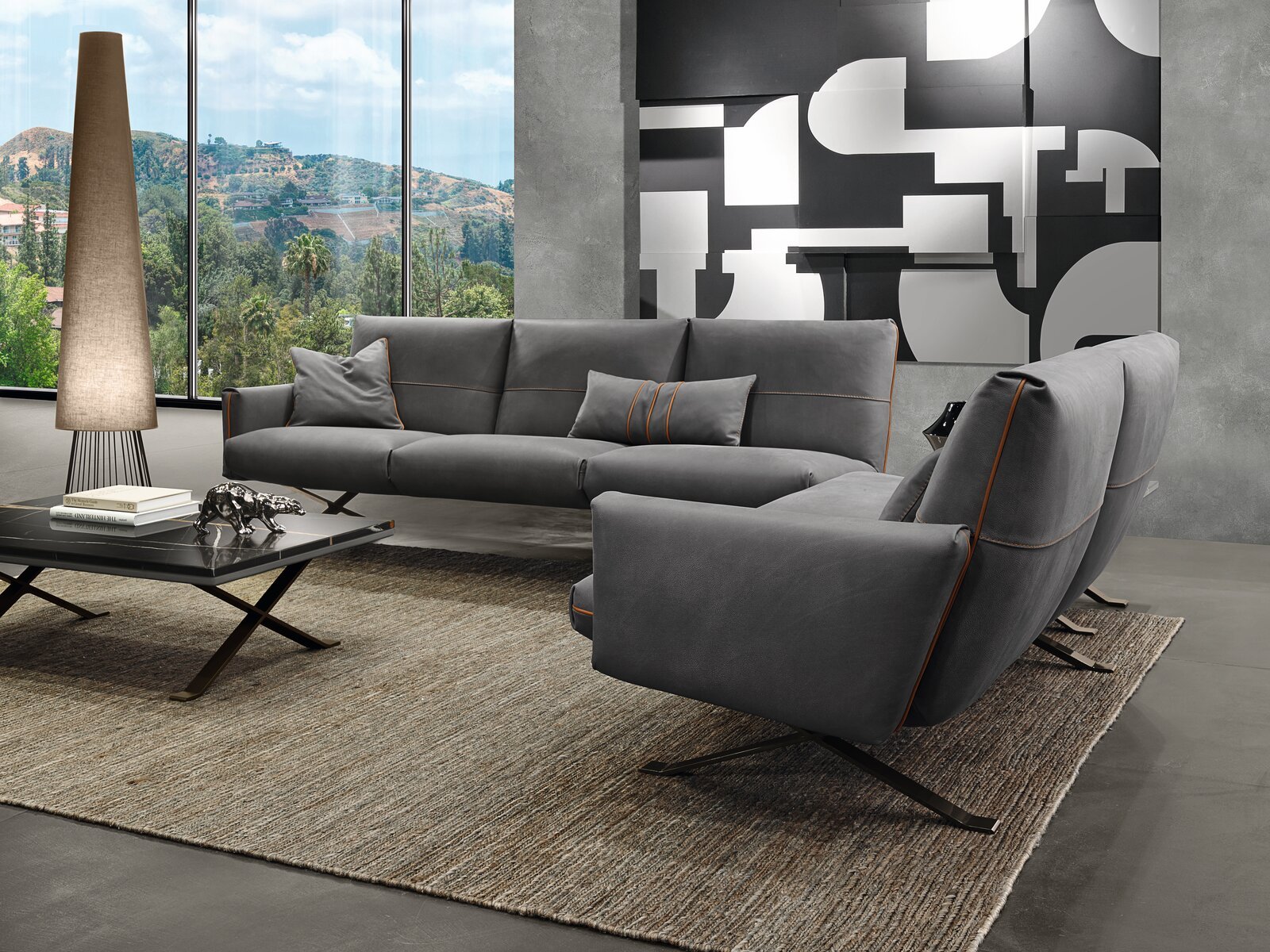 Rialto table basse de Gamma Arredamenti associe métal, verre fumé, céramique ou marbre dans un design léger et raffiné. Disponible chez D-Style Interior.